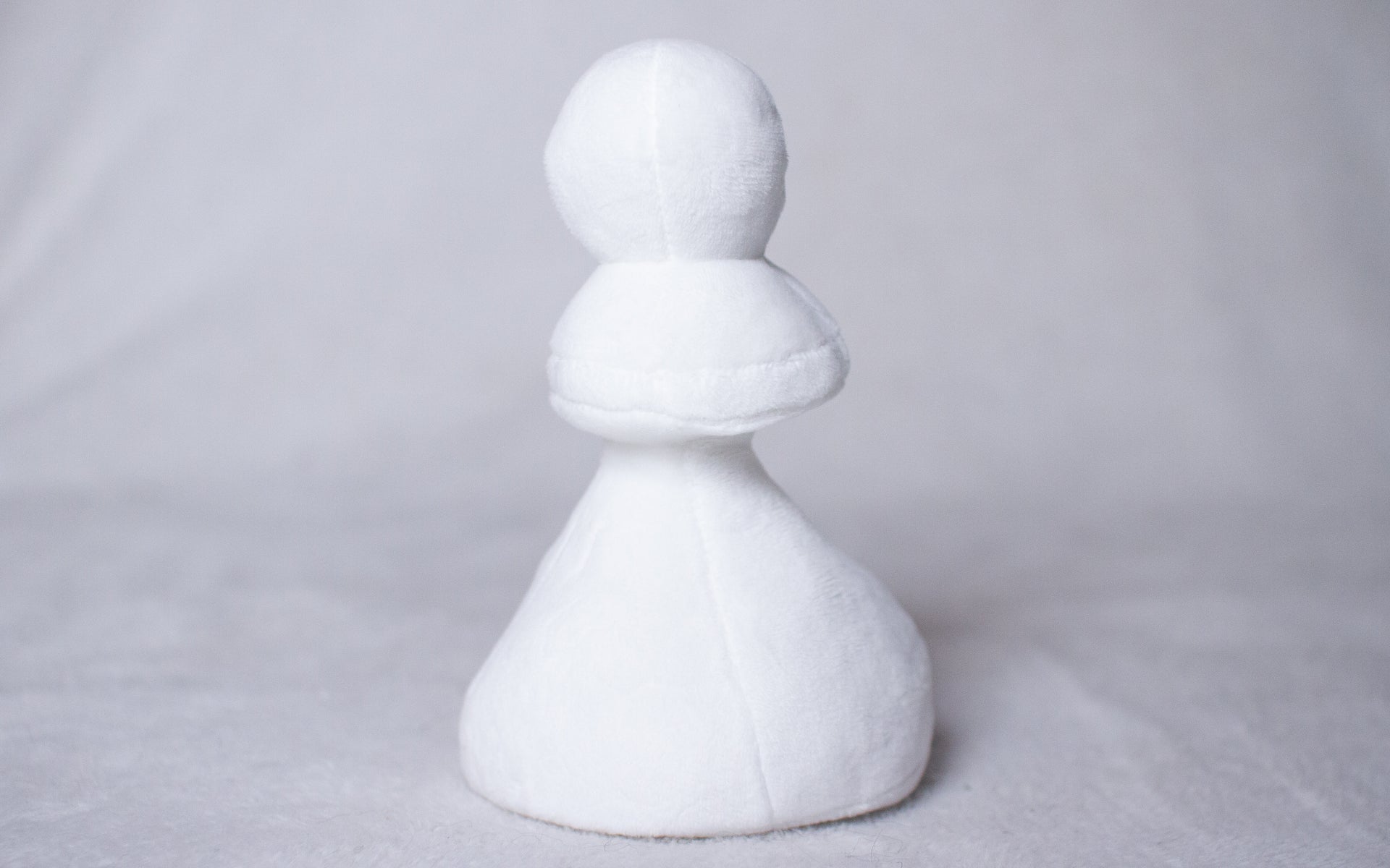 Plush White Pawn Toy
